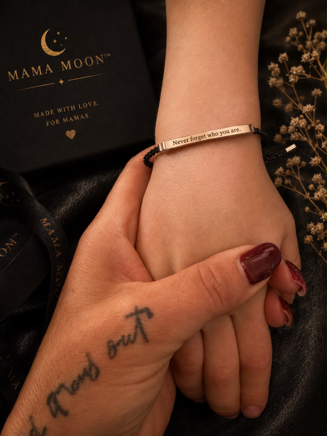 Mama Moon Never Forget Who You Are engraved bracelet with black cord and gold-tone bar