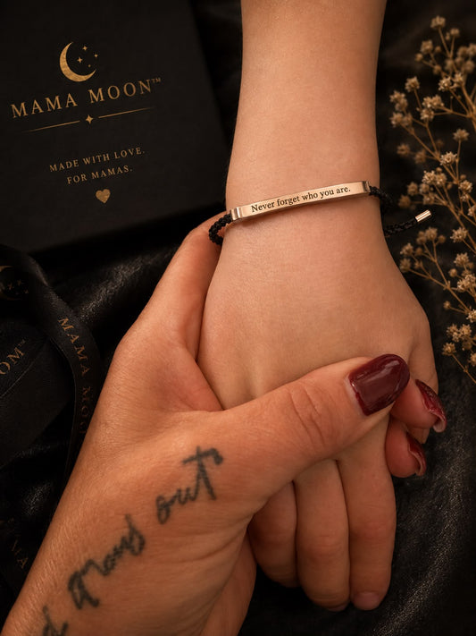 Mama Moon Never Forget Who You Are engraved bracelet with black cord and gold-tone bar